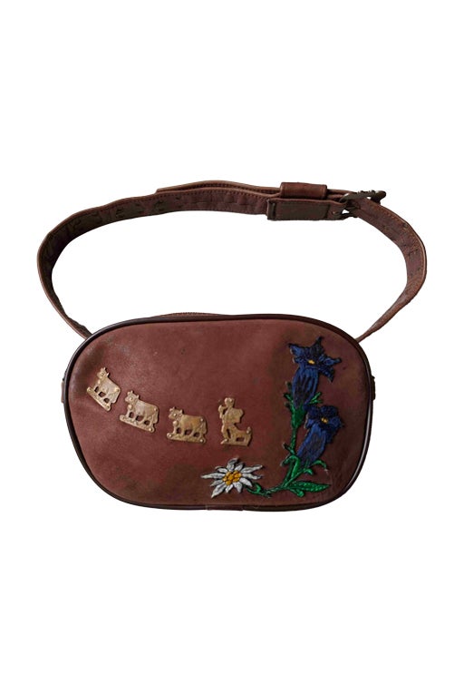 Embroidered suede bag