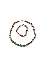 Parure en pierres 90's