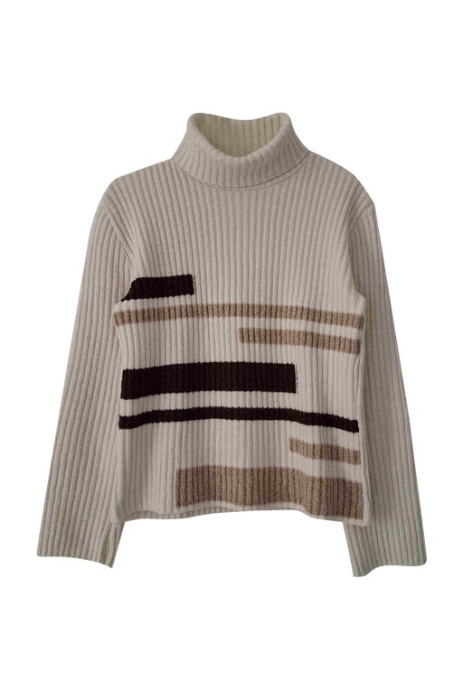 Col roulé en mailles