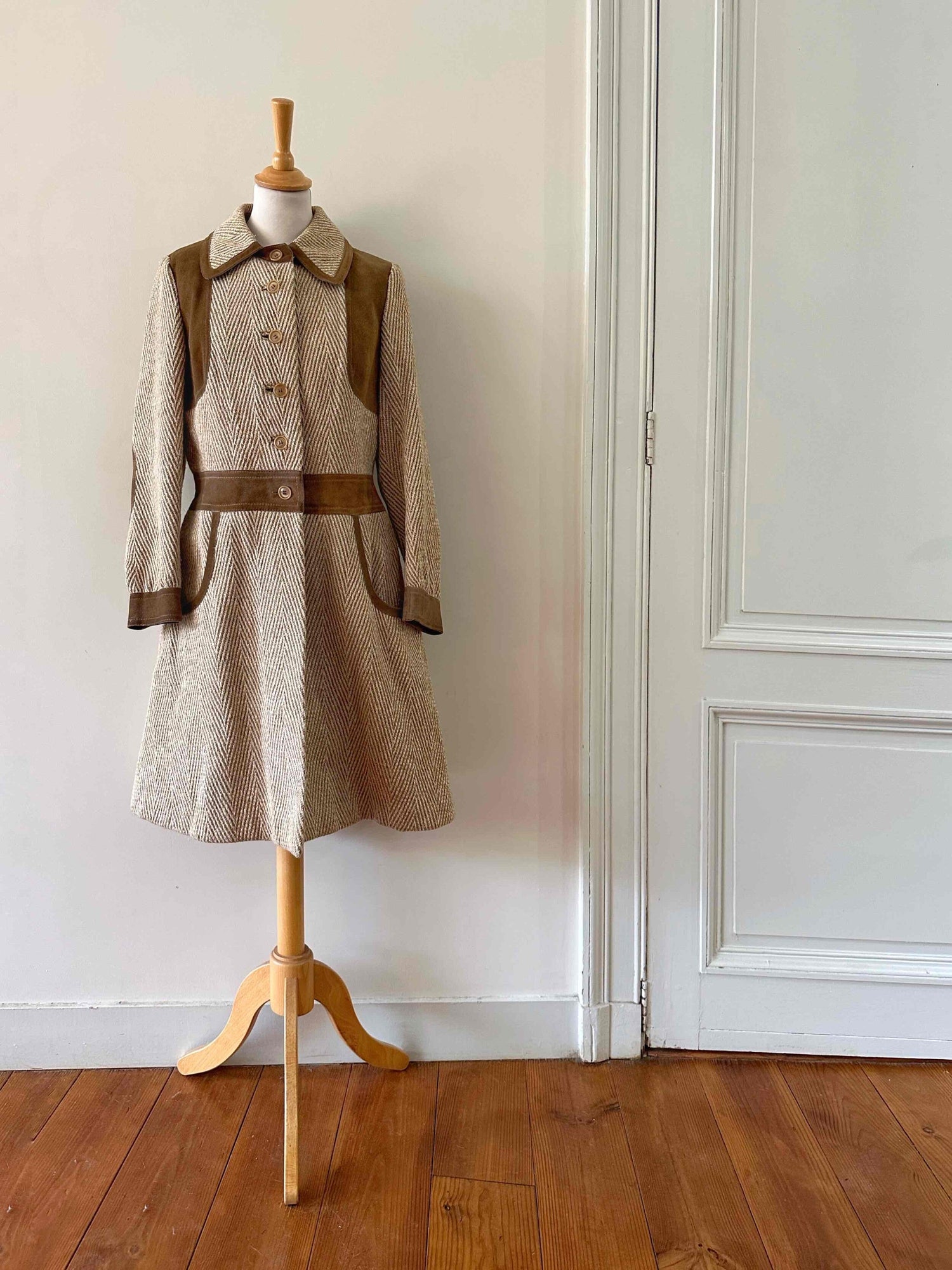 Manteau en laine et cuir