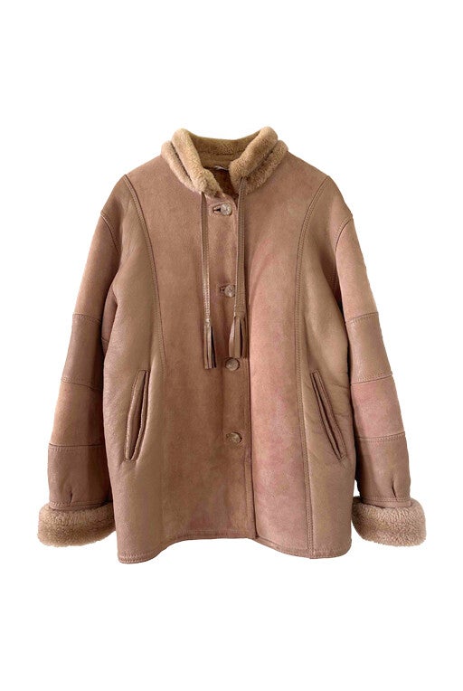 Sheepskin and leather coat
