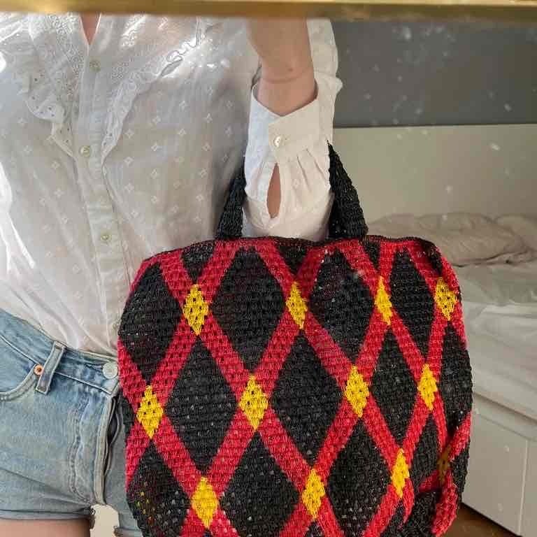 Woven plastic basket