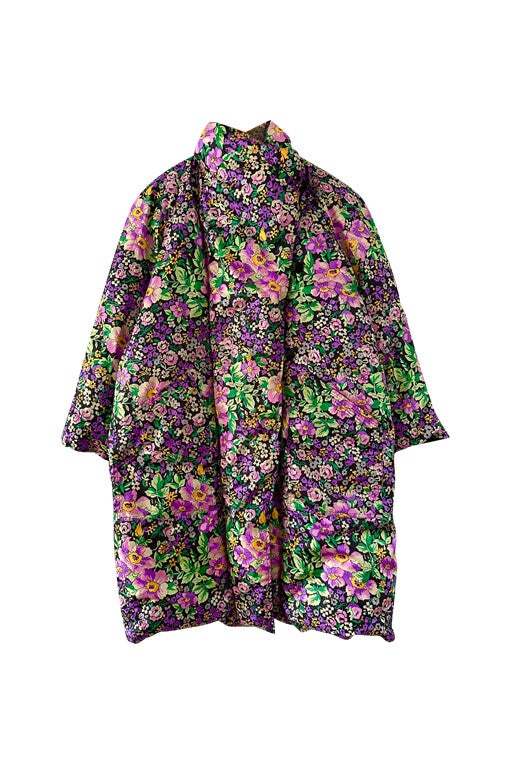 Reversible floral puffer jacket