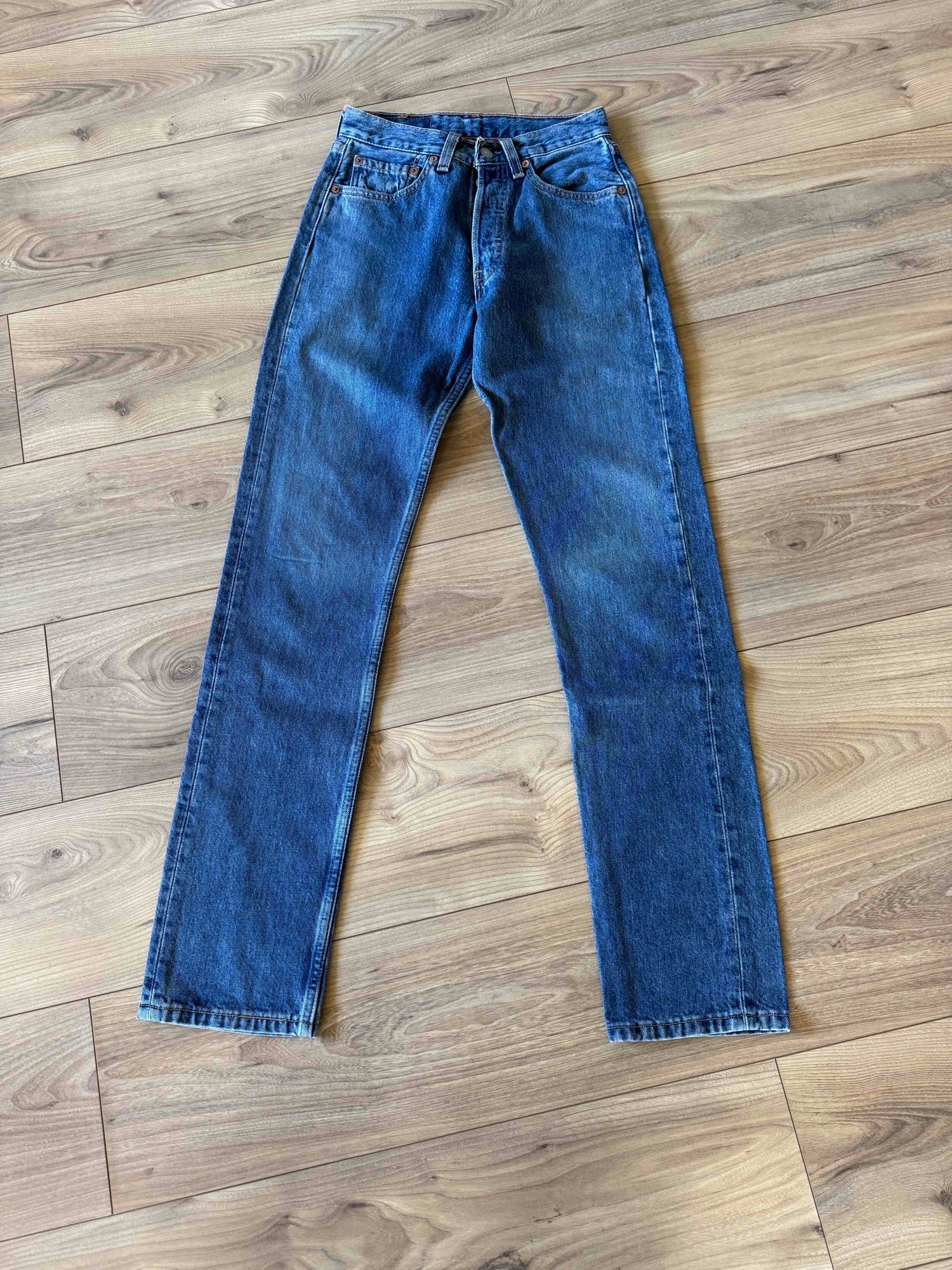 Levi's 501 jeans, waist 26, length 32.