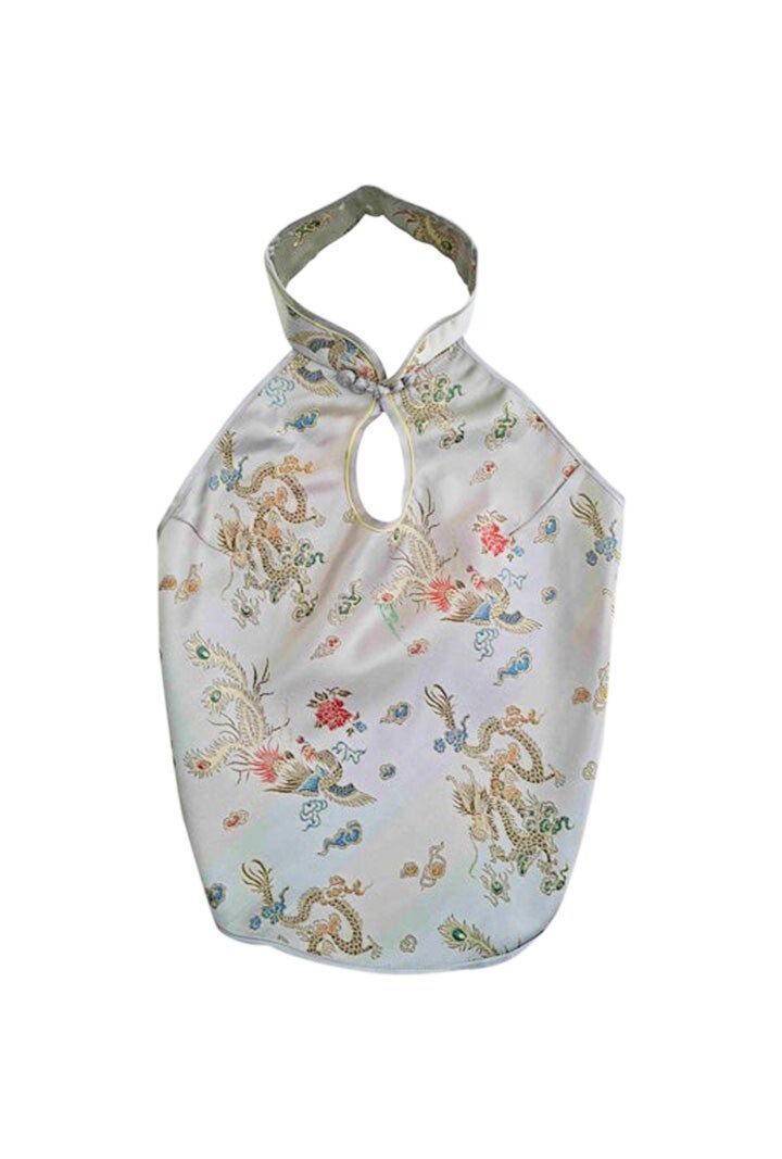 Top asiatique dos nu