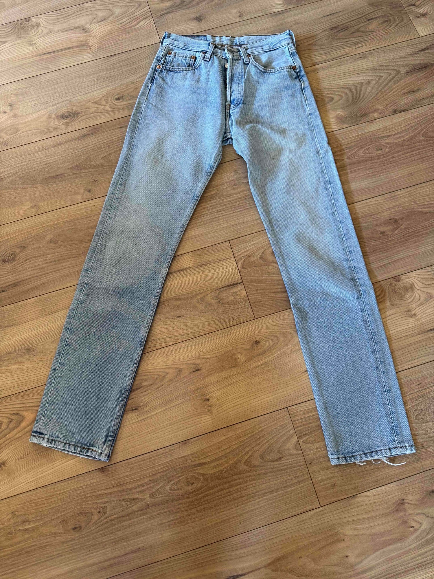 Levi's 501 jeans, waist 26, length 32.