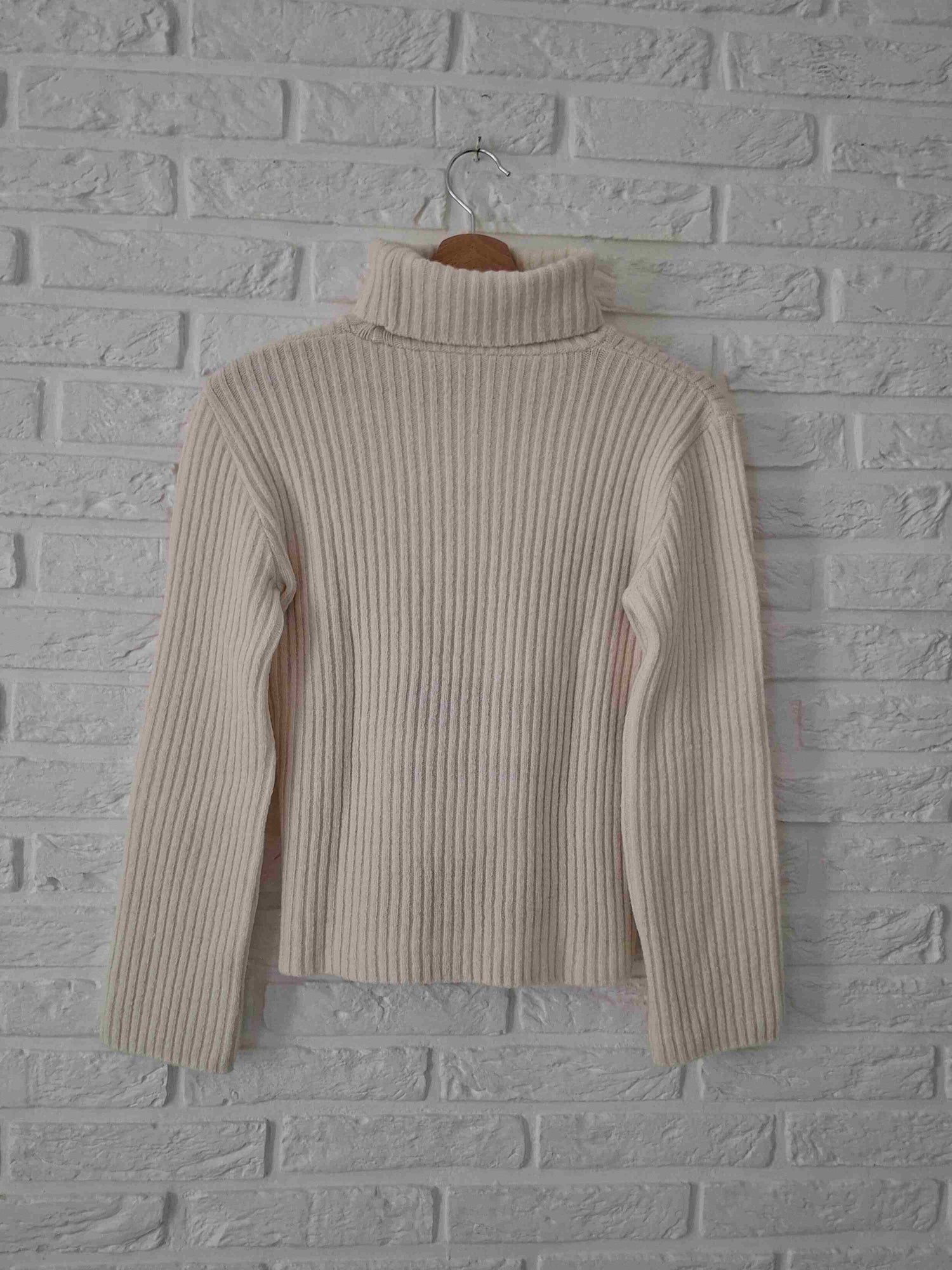 Col roulé en mailles