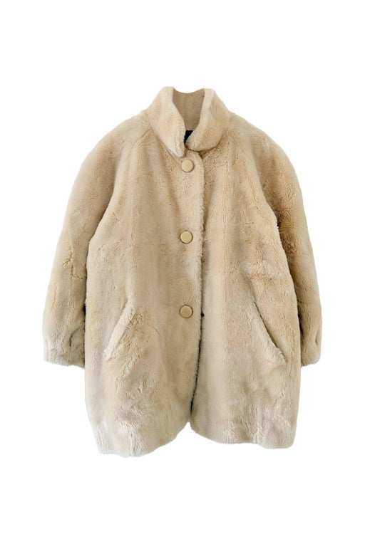 Manteau en fausse fourrure