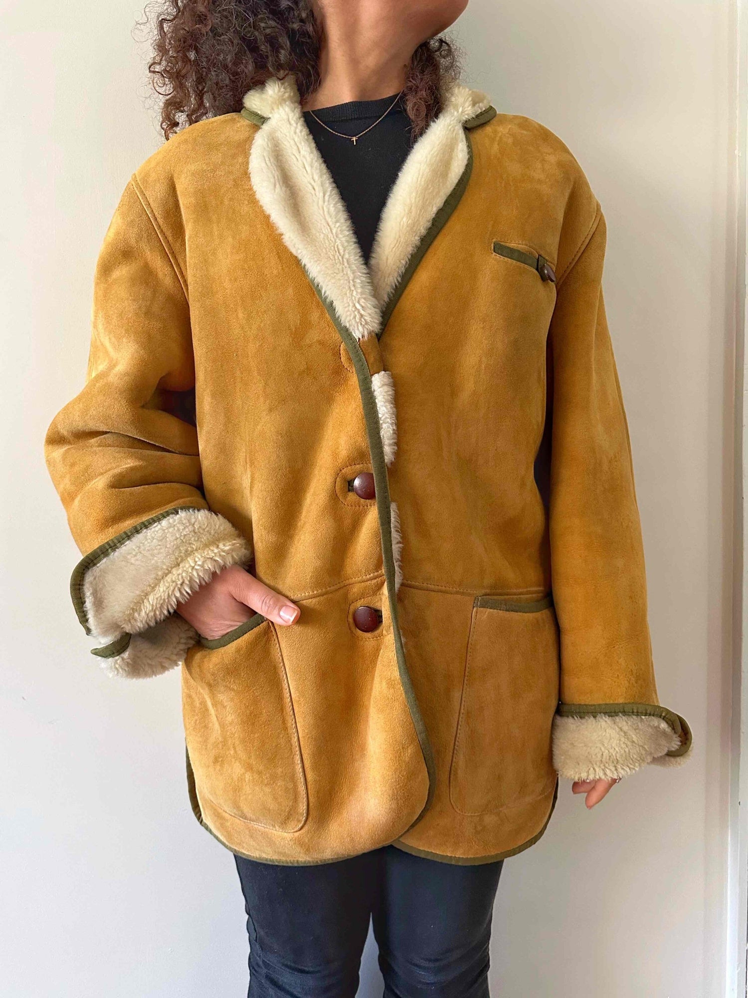 Manteau en peau lainée