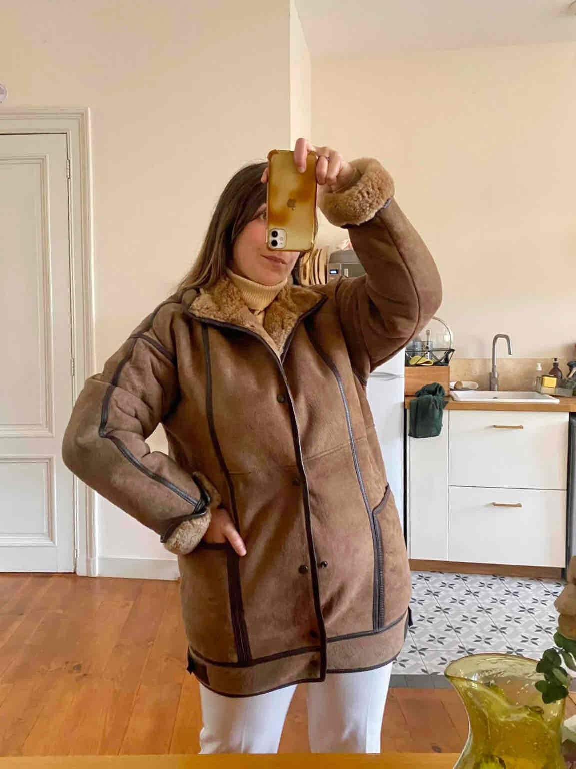 Manteau en peau lainée