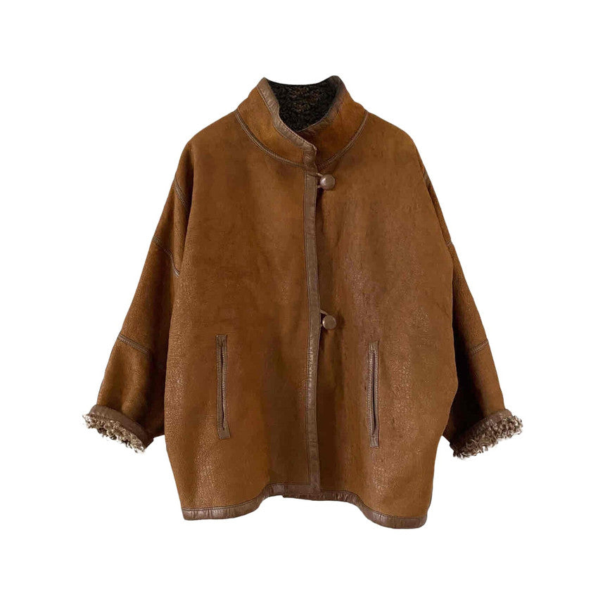 Manteau en peau lainée