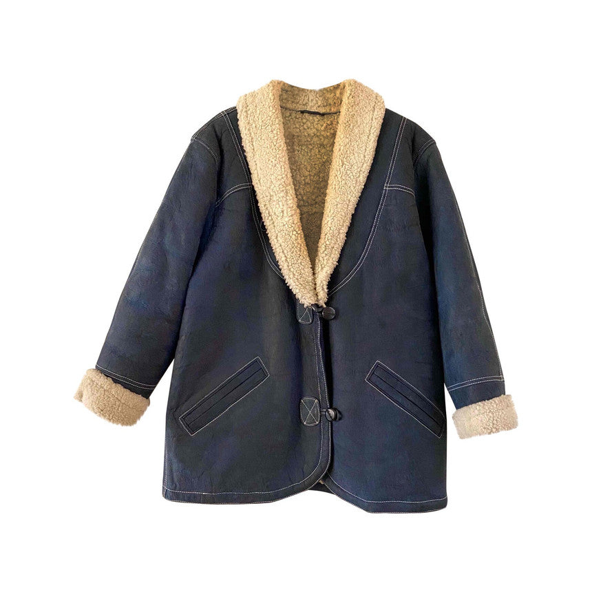 Manteau en peau lainée