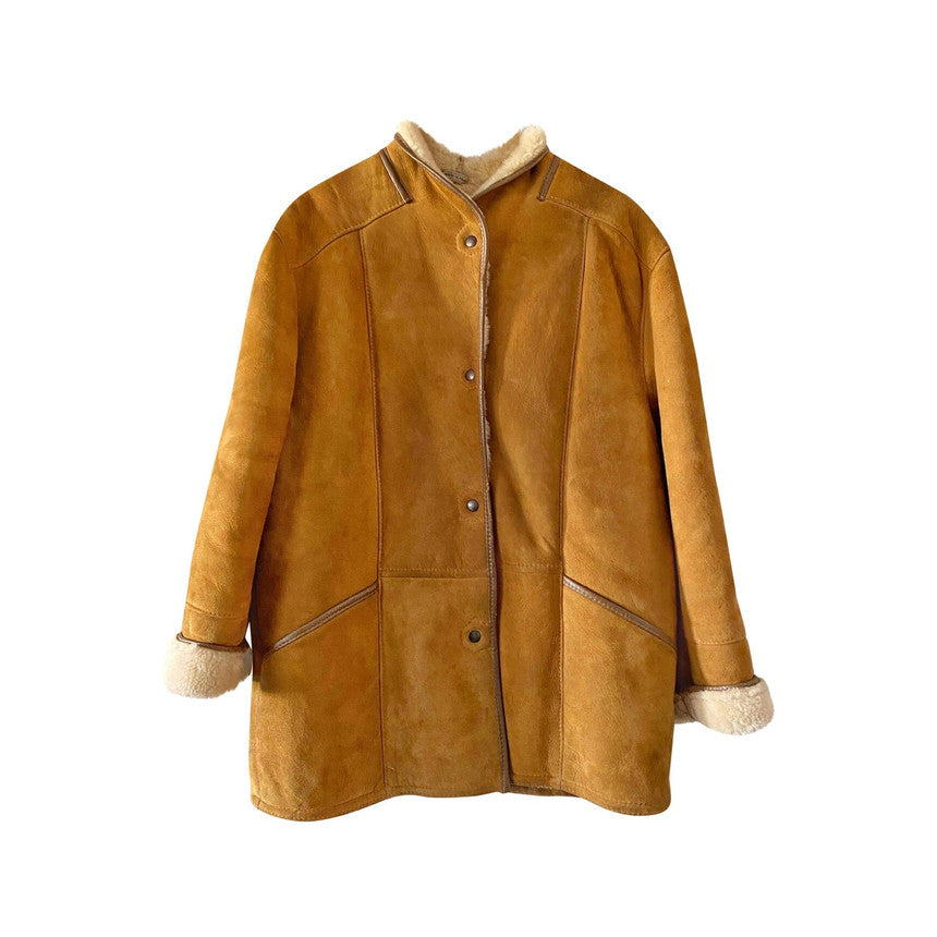 Manteau en peau lainée