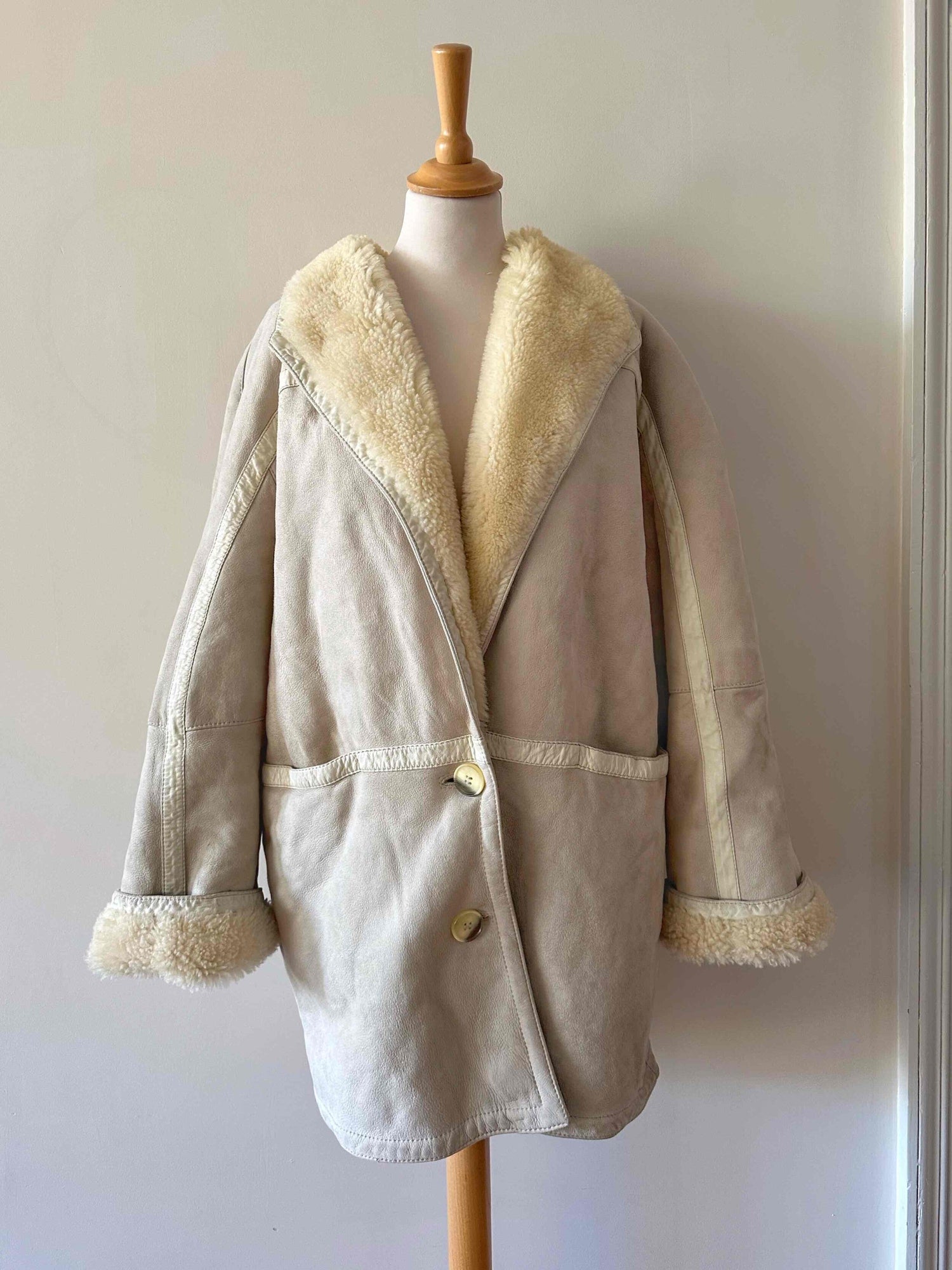 Manteau en peau lainée