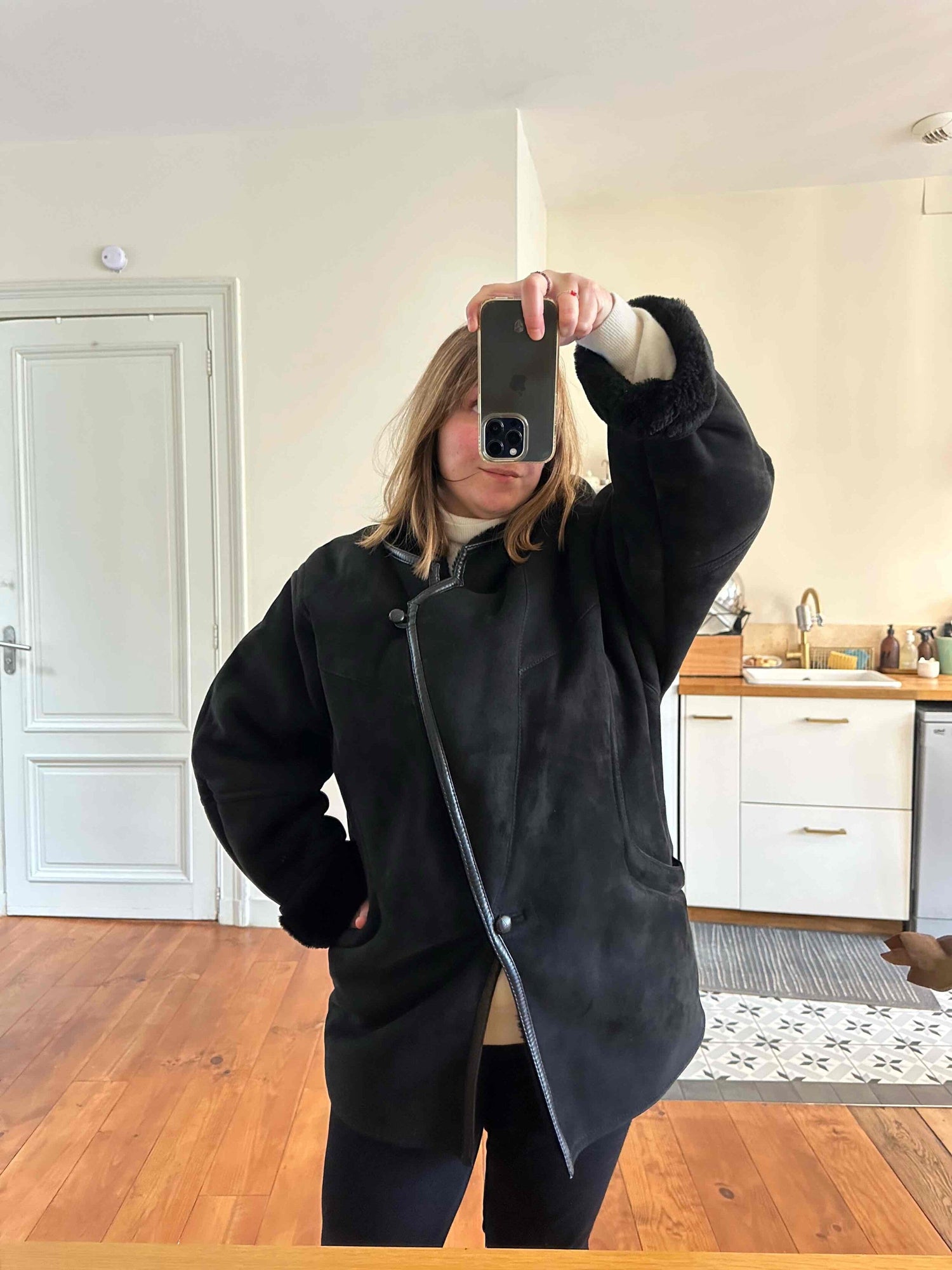 Manteau en peau lainée