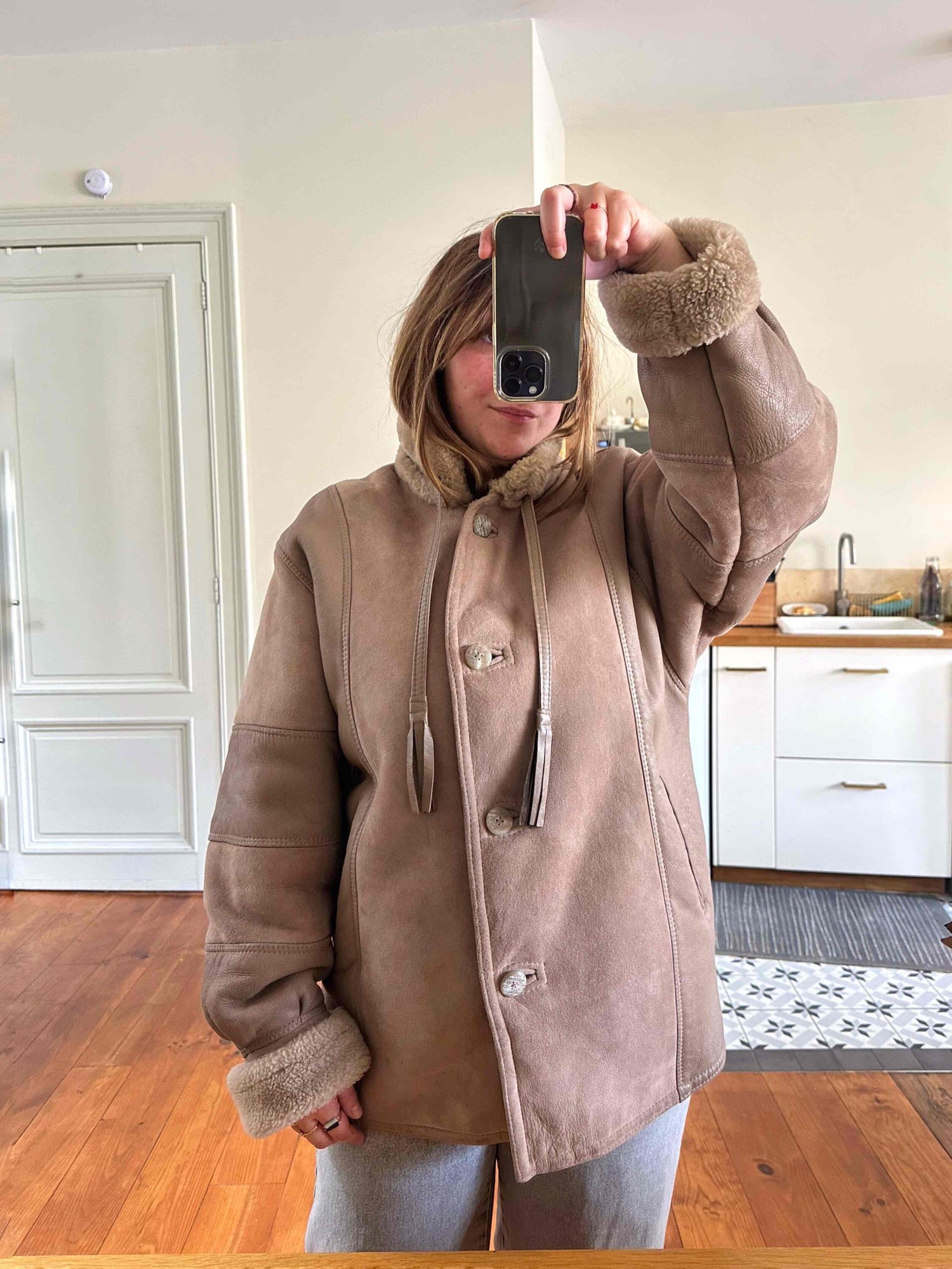 Sheepskin and leather coat