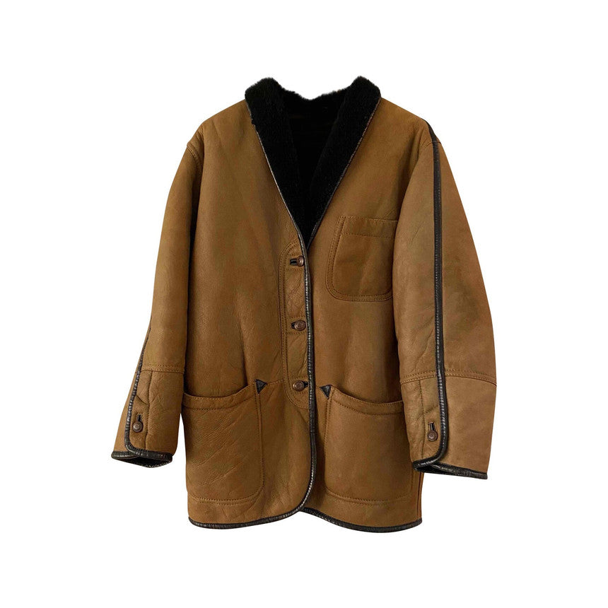 Manteau en peau lainée