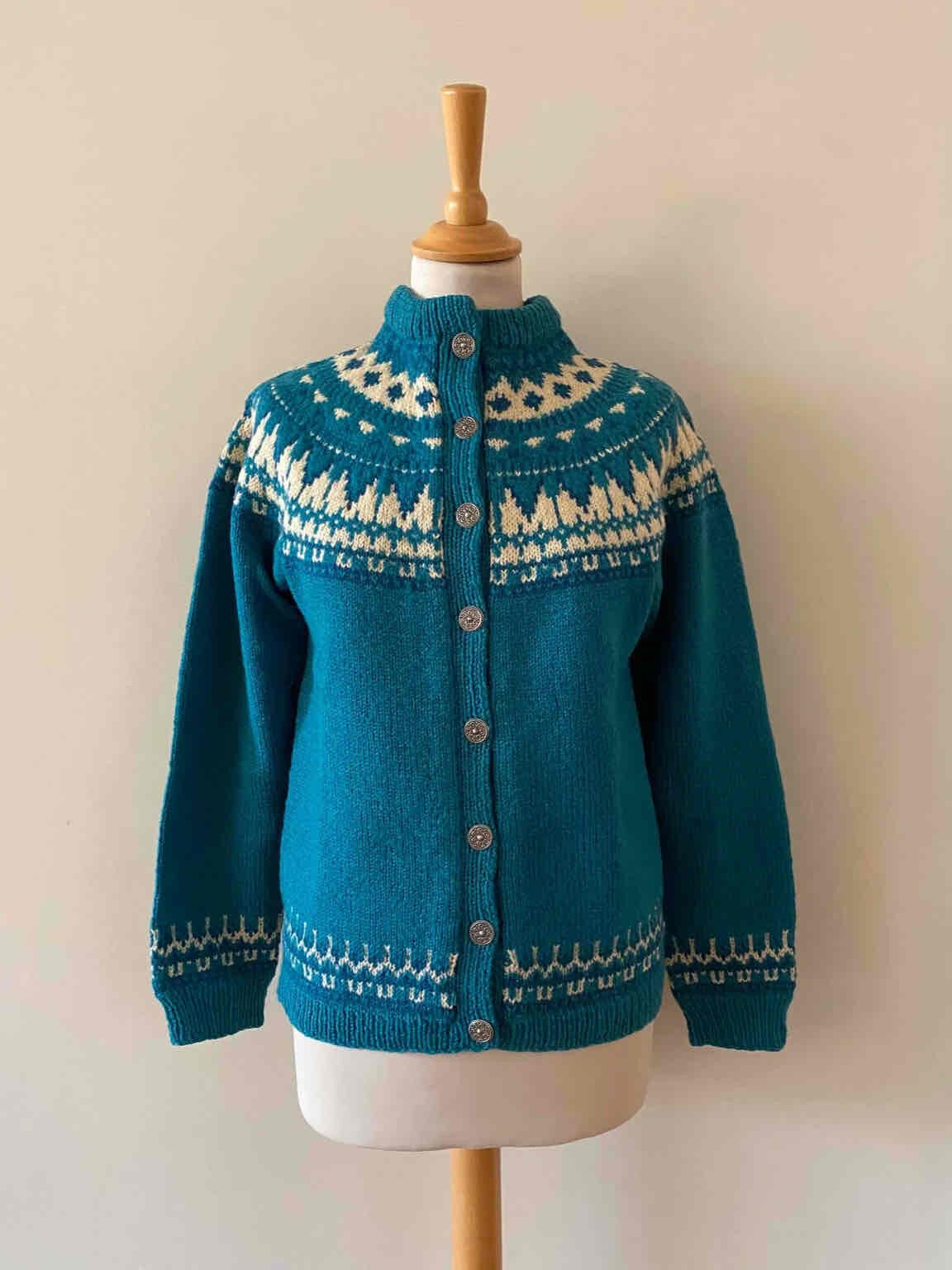 Norwegian cardigan in pure petrol blue wool,