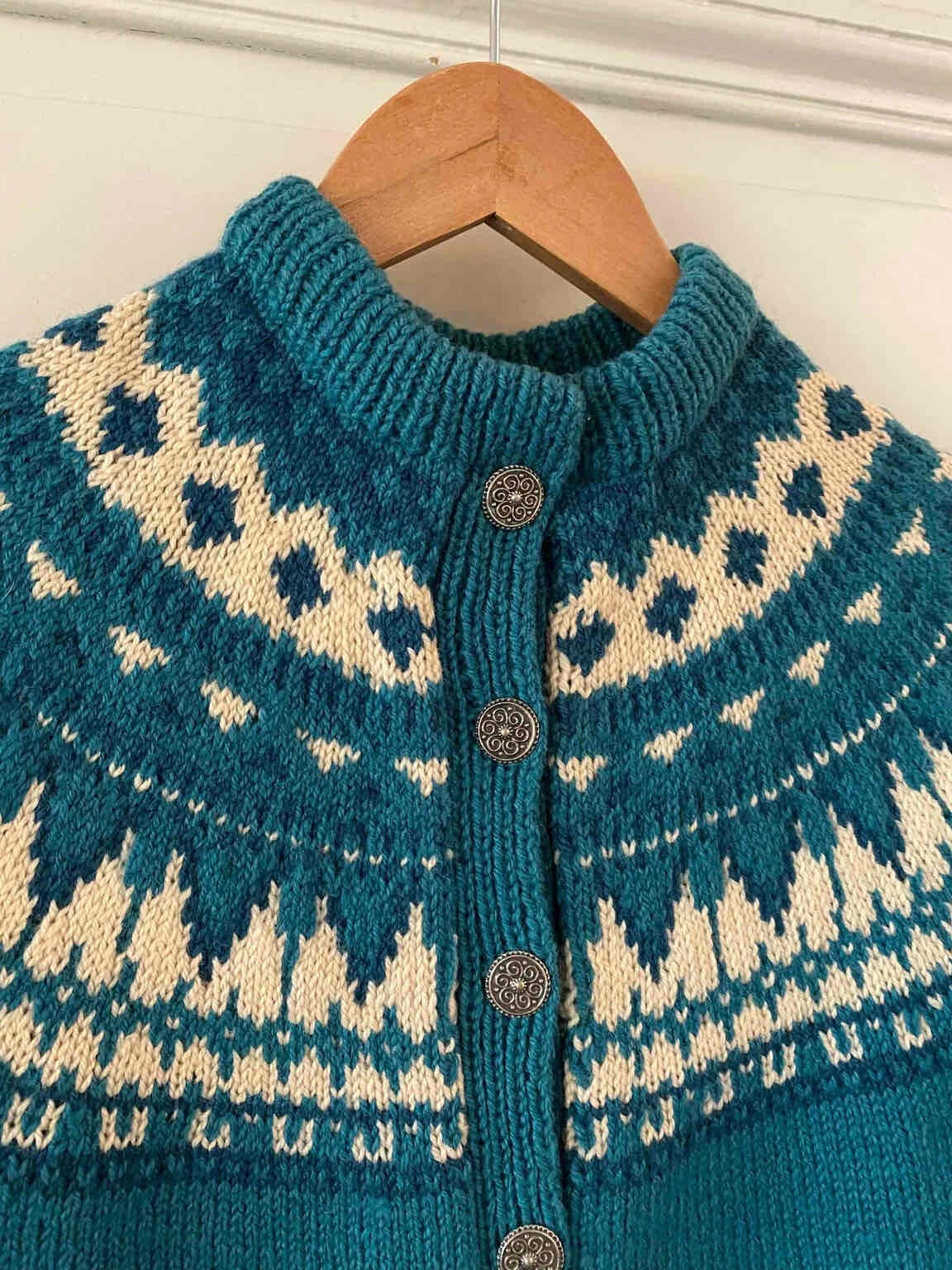 Norwegian cardigan in pure petrol blue wool,