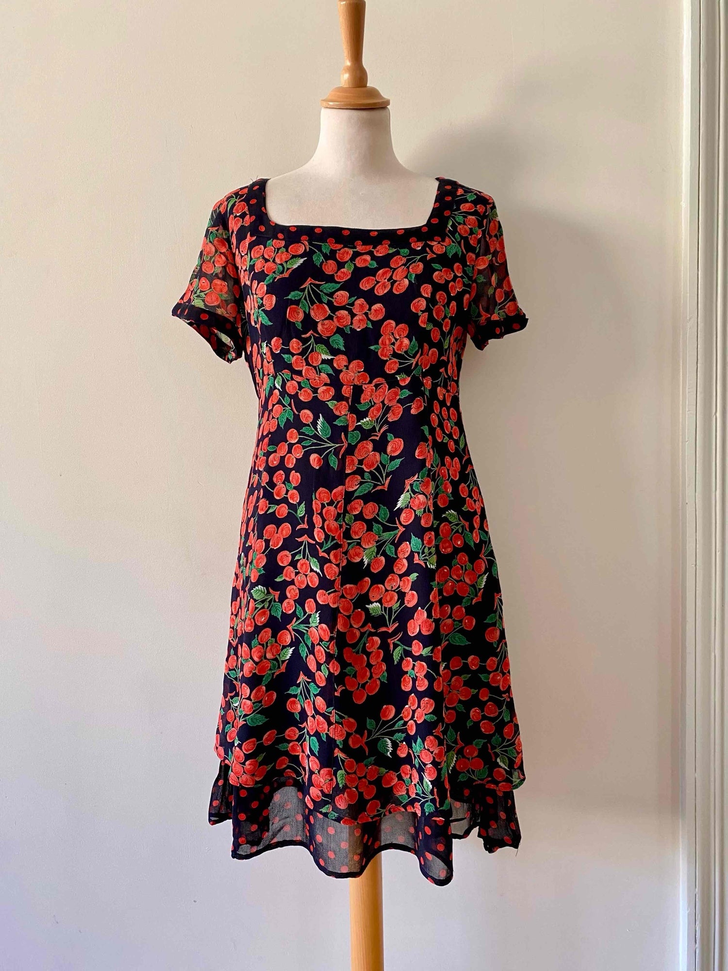 Mini dress with cherries and peas pattern