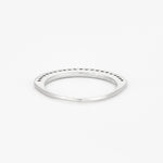 Demi-alliance en or blanc et diamants