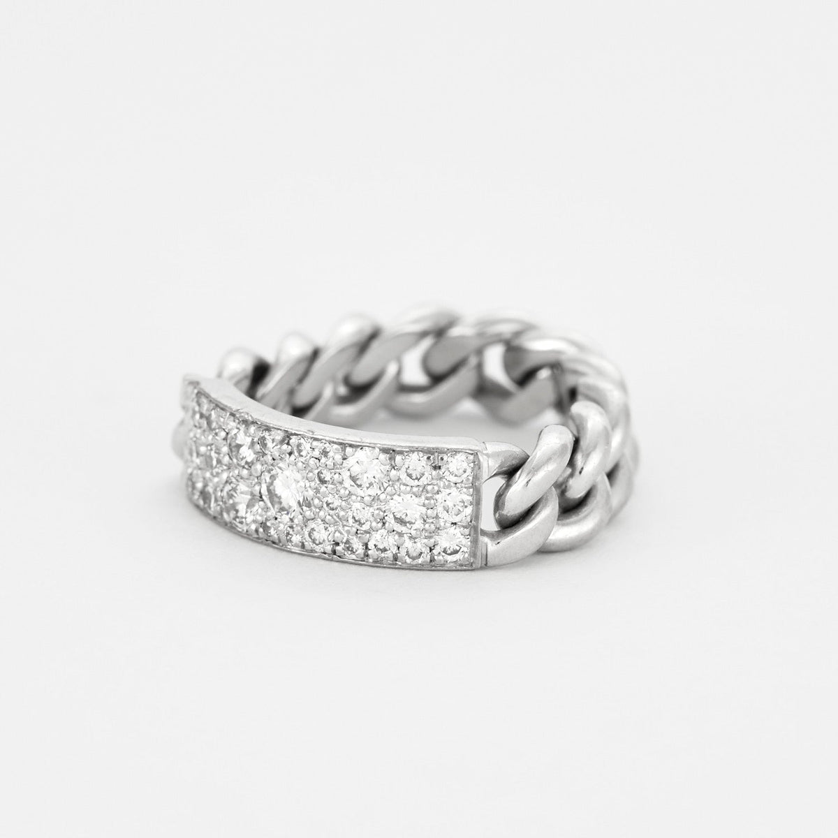 DIOR - Bague  "Gourmette", or gris et diamants.