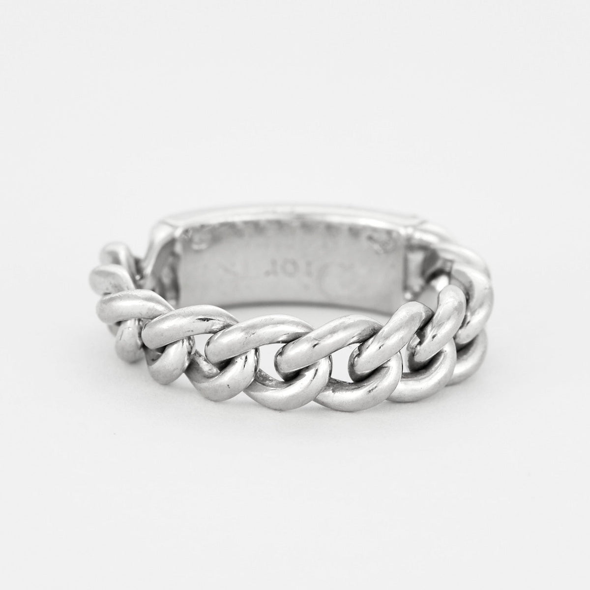 DIOR - Bague  "Gourmette", or gris et diamants.