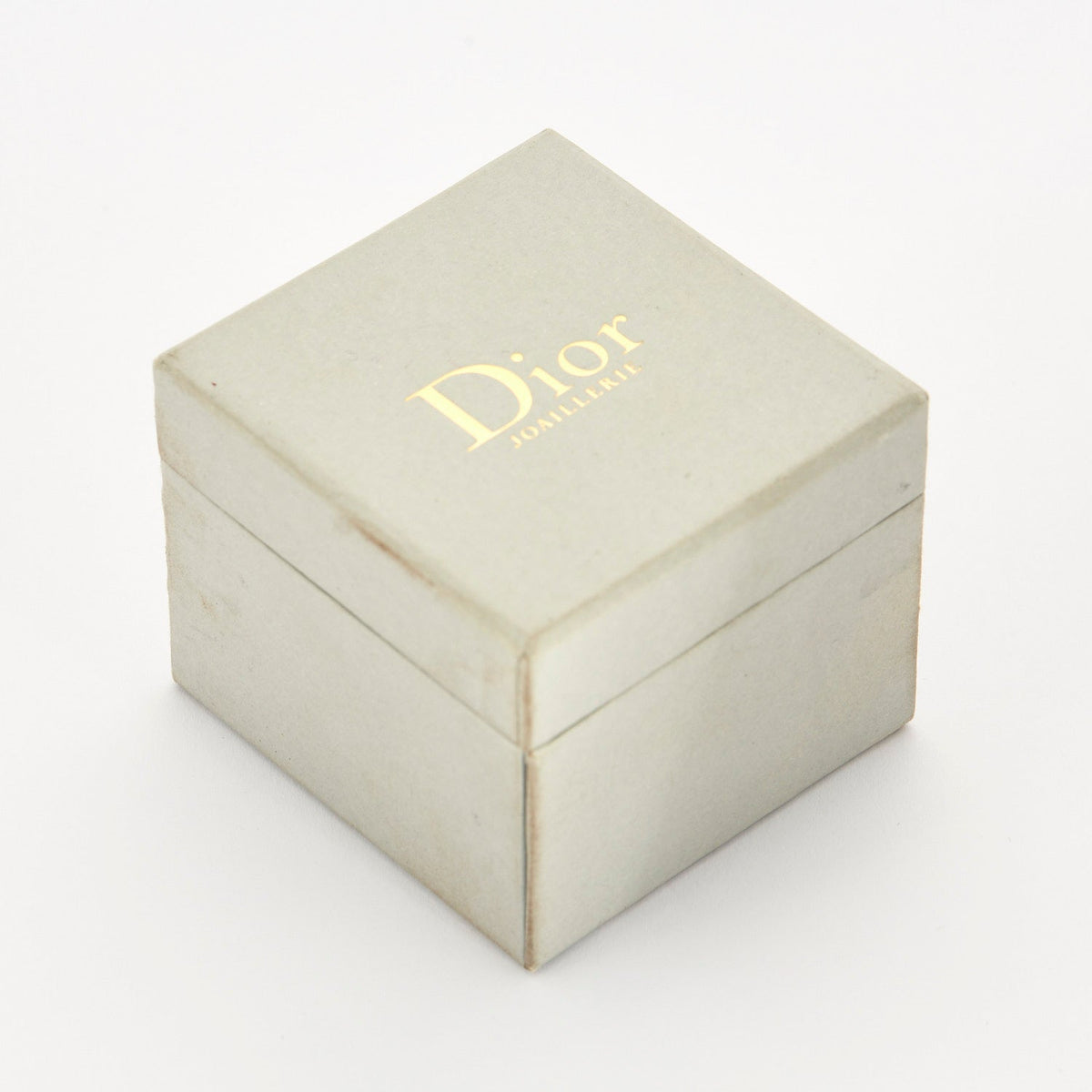 DIOR - Bague  "Gourmette", or gris et diamants.