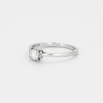 Bague solitaire en or gris et diamant