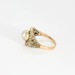 Bague Art déco, deux ors, perle bouton et diamants