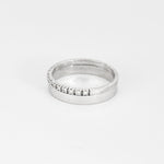 Bague demi-alliance en or blanc et diamants