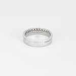 Bague demi-alliance en or blanc et diamants