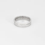 Bague demi-alliance en or blanc et diamants