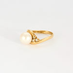 Bague en or jaune, perle de culture et diamants