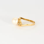 Bague en or jaune, perle de culture et diamants