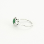 Bague marguerite en or blanc, émeraude et diamants