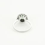 Bague marguerite en or blanc, émeraude et diamants