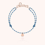 Bracelet Cordon Slim Knot Personnalisé porté au poignet — or rose laminé livraison soigneuse garantie