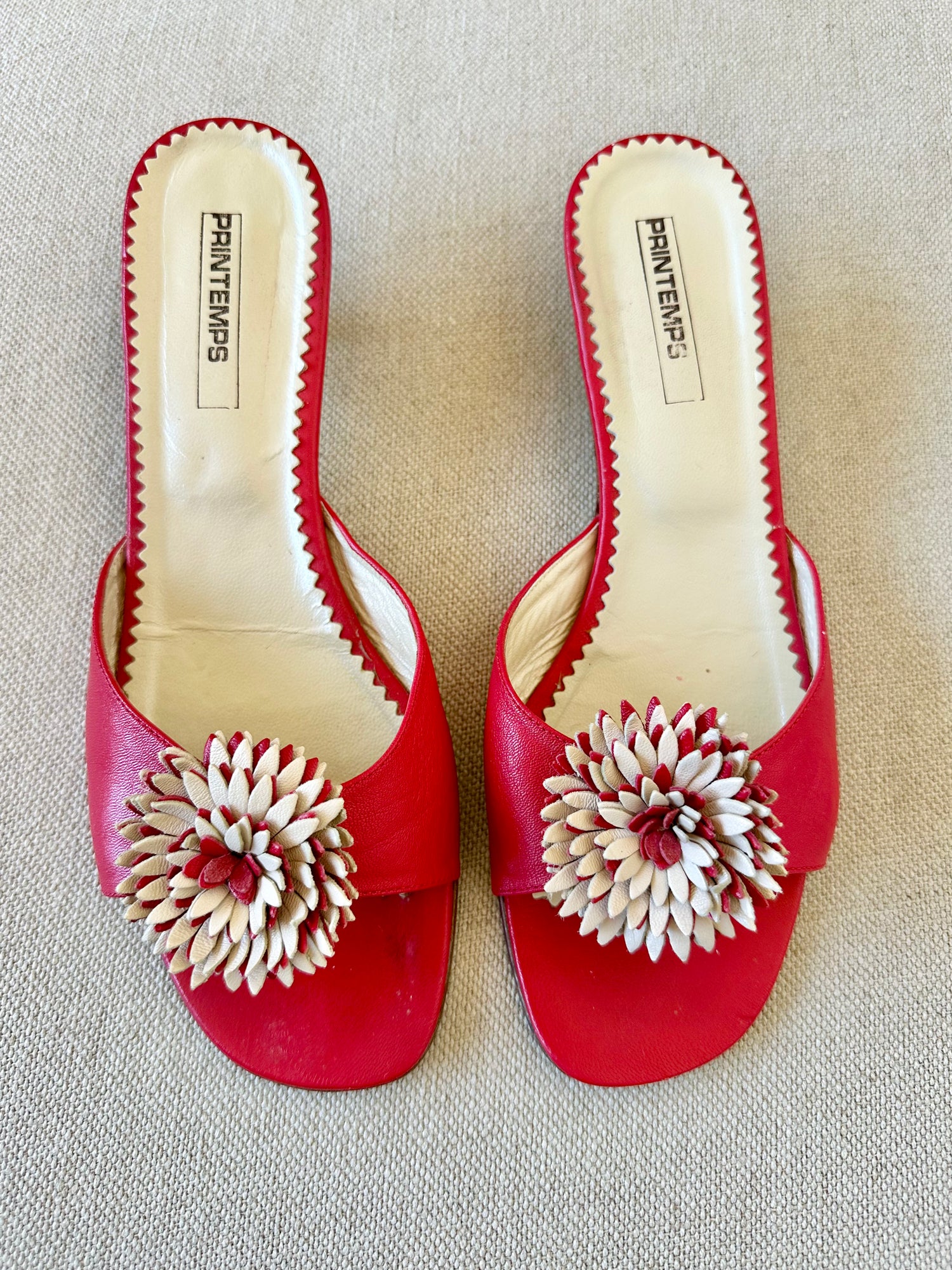 Mules à fleurs en cuir