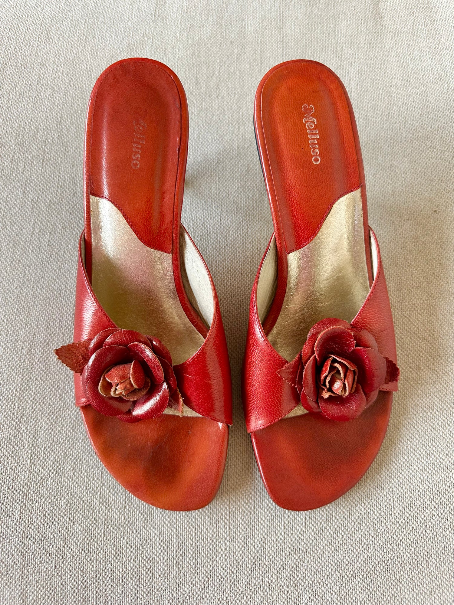 Mules à fleurs en cuir