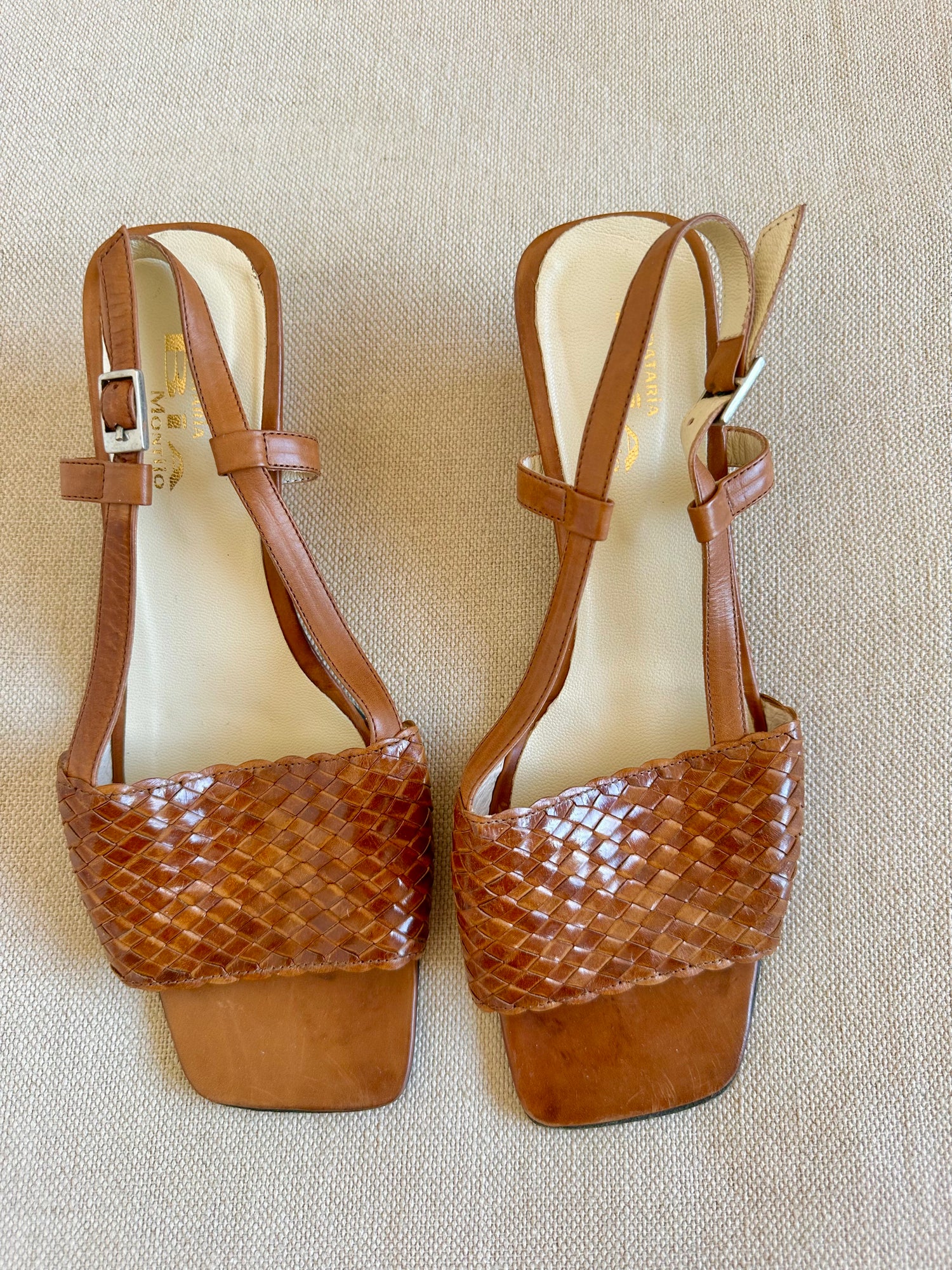 Mules tressées en cuir
