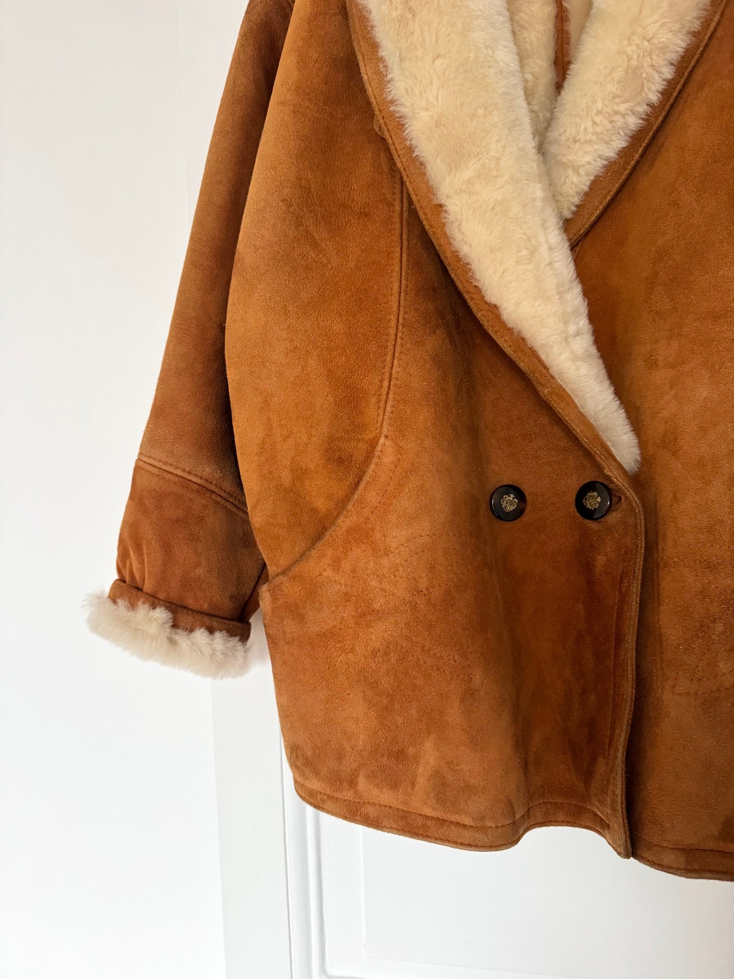 Manteau en peau lainée