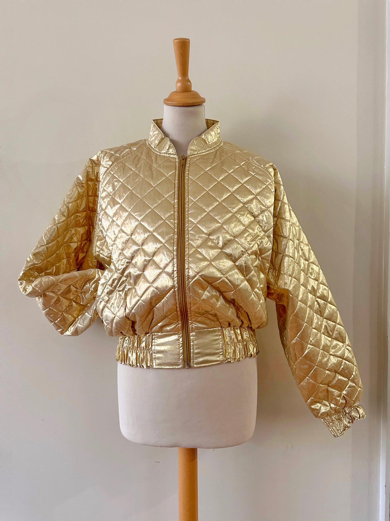 Blouson matelassé doré