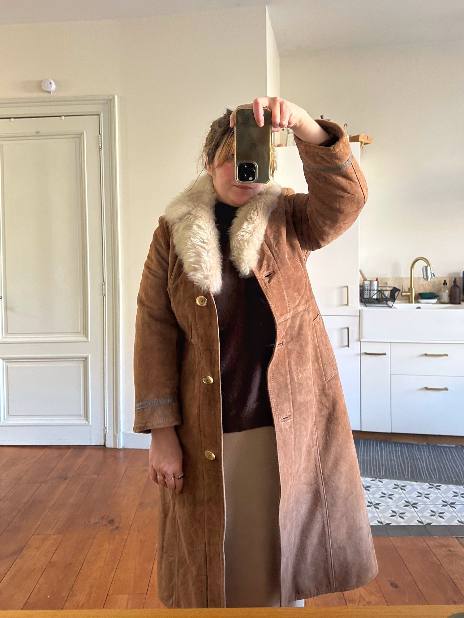 Manteau en peau lainée