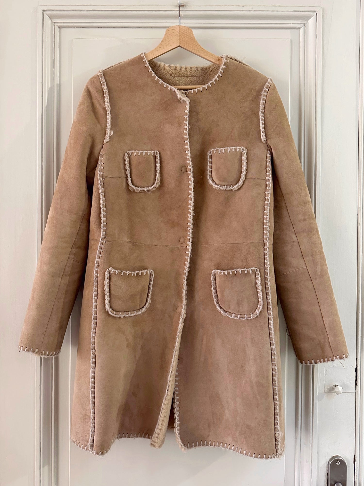 Manteau en peau lainée