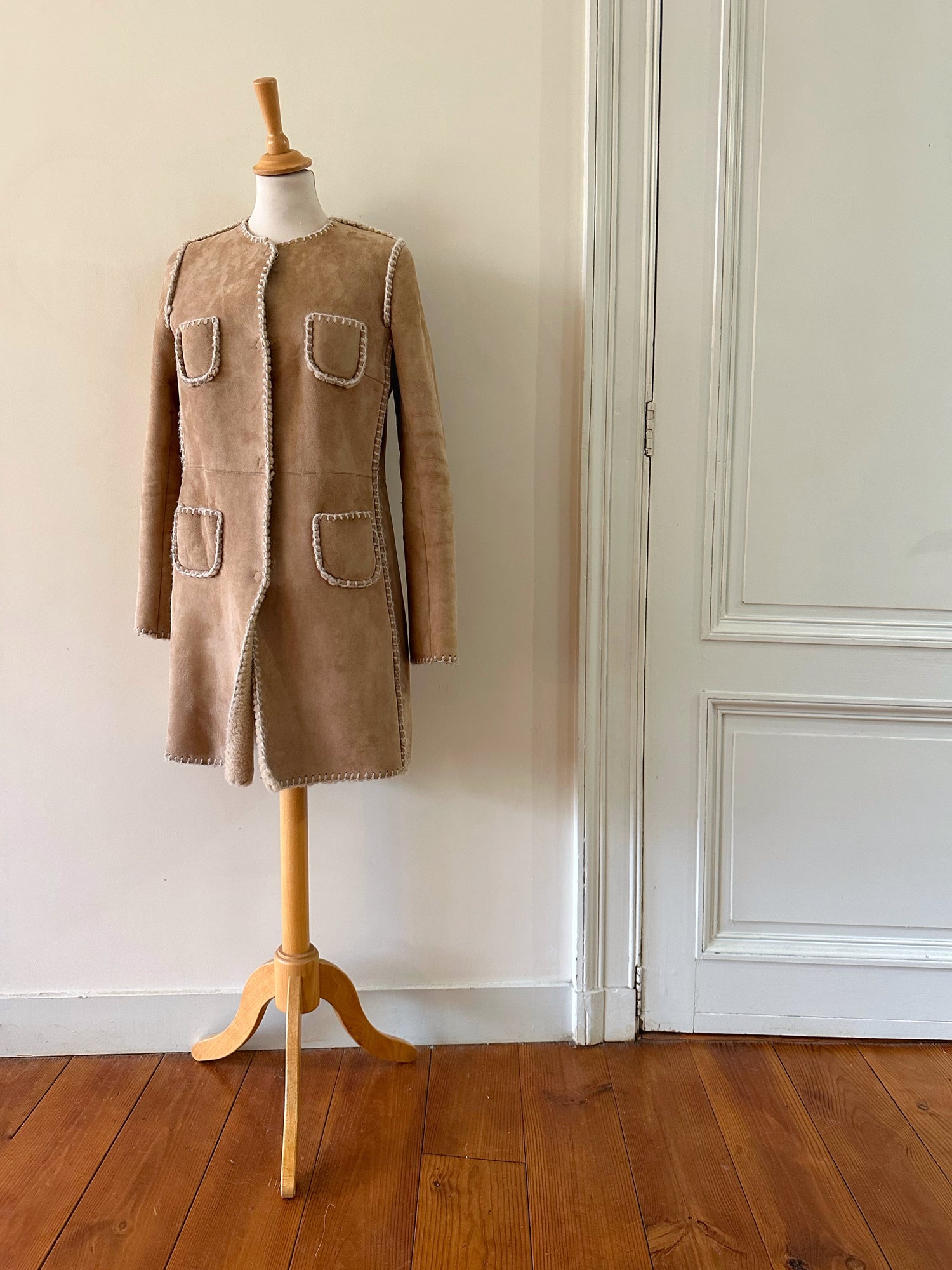 Manteau en peau lainée