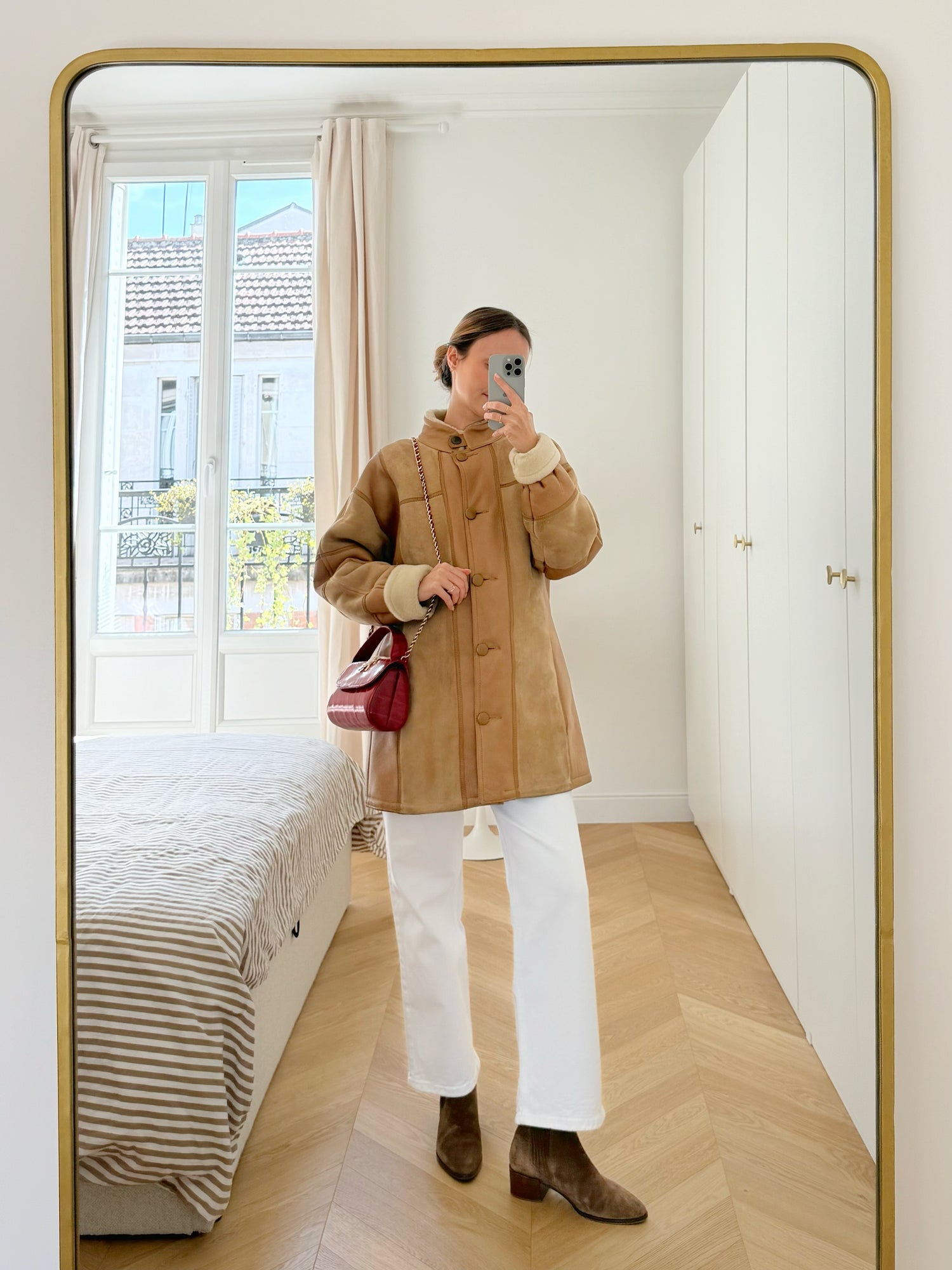 Manteau en peau lainée