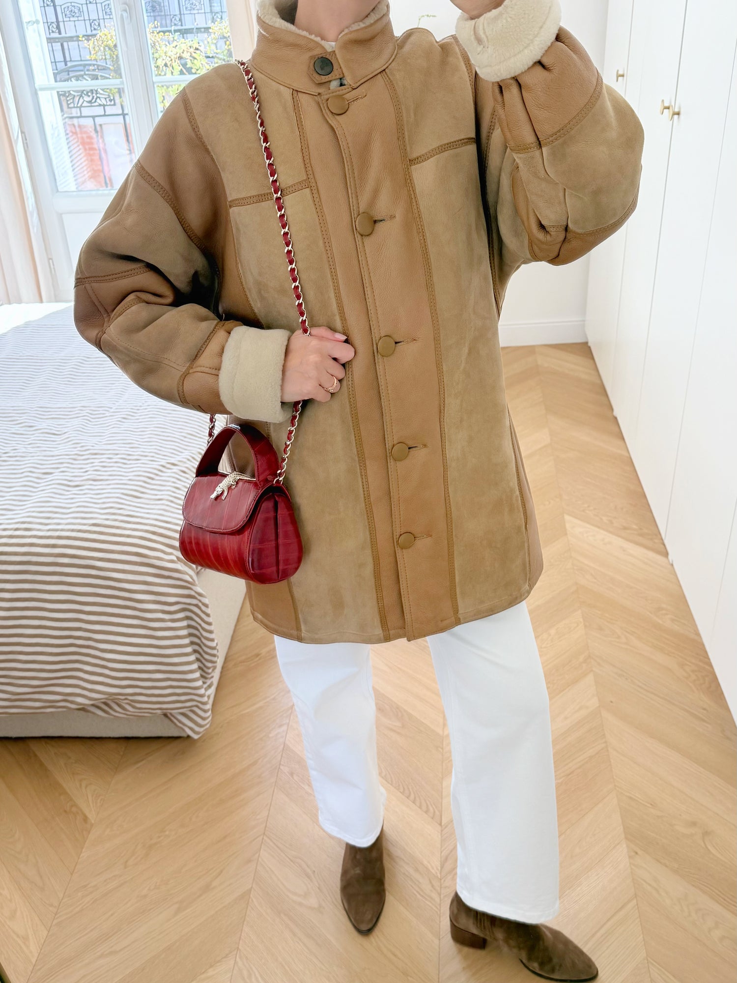 Manteau en peau lainée