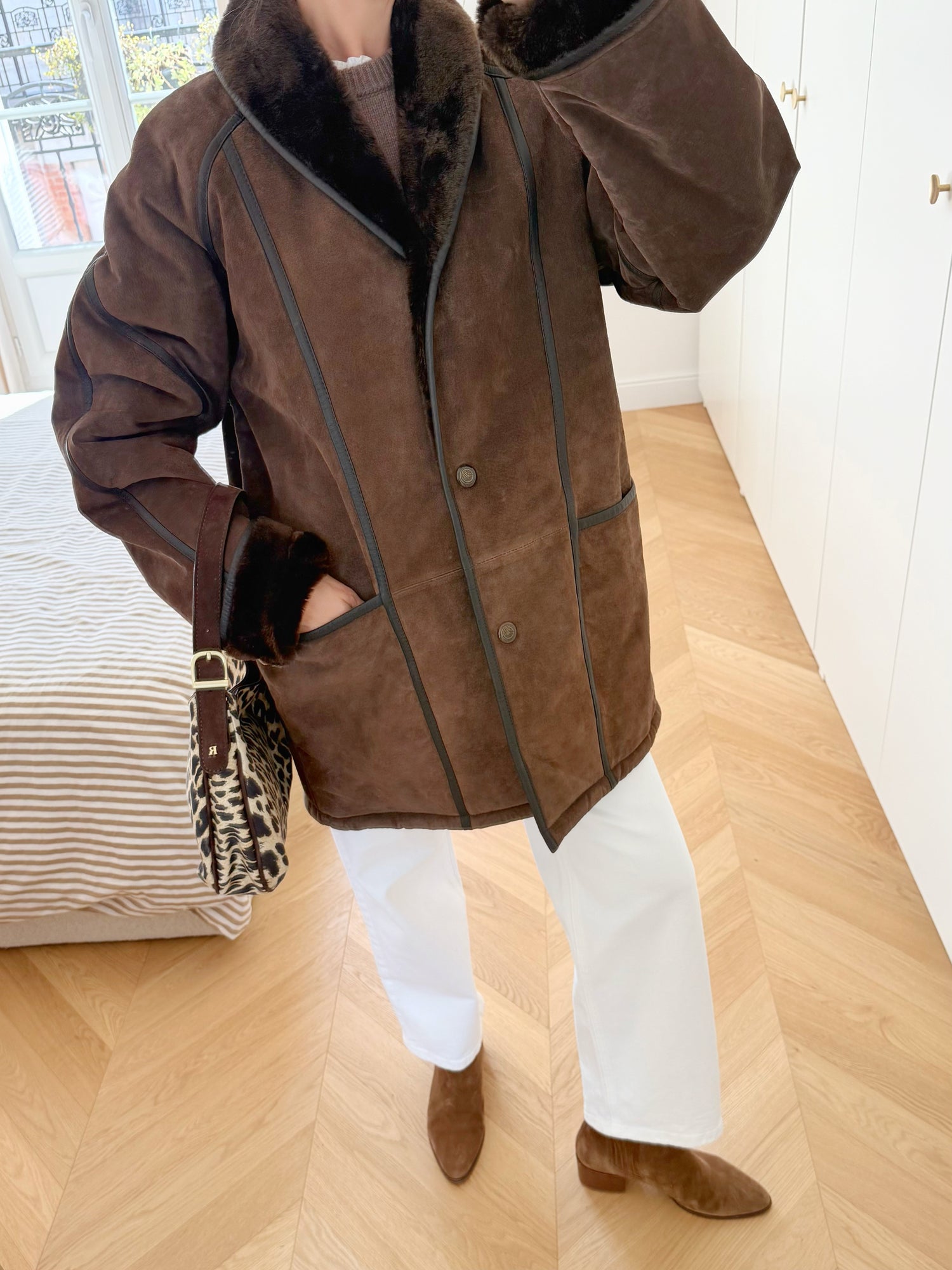 Manteau en peau lainée