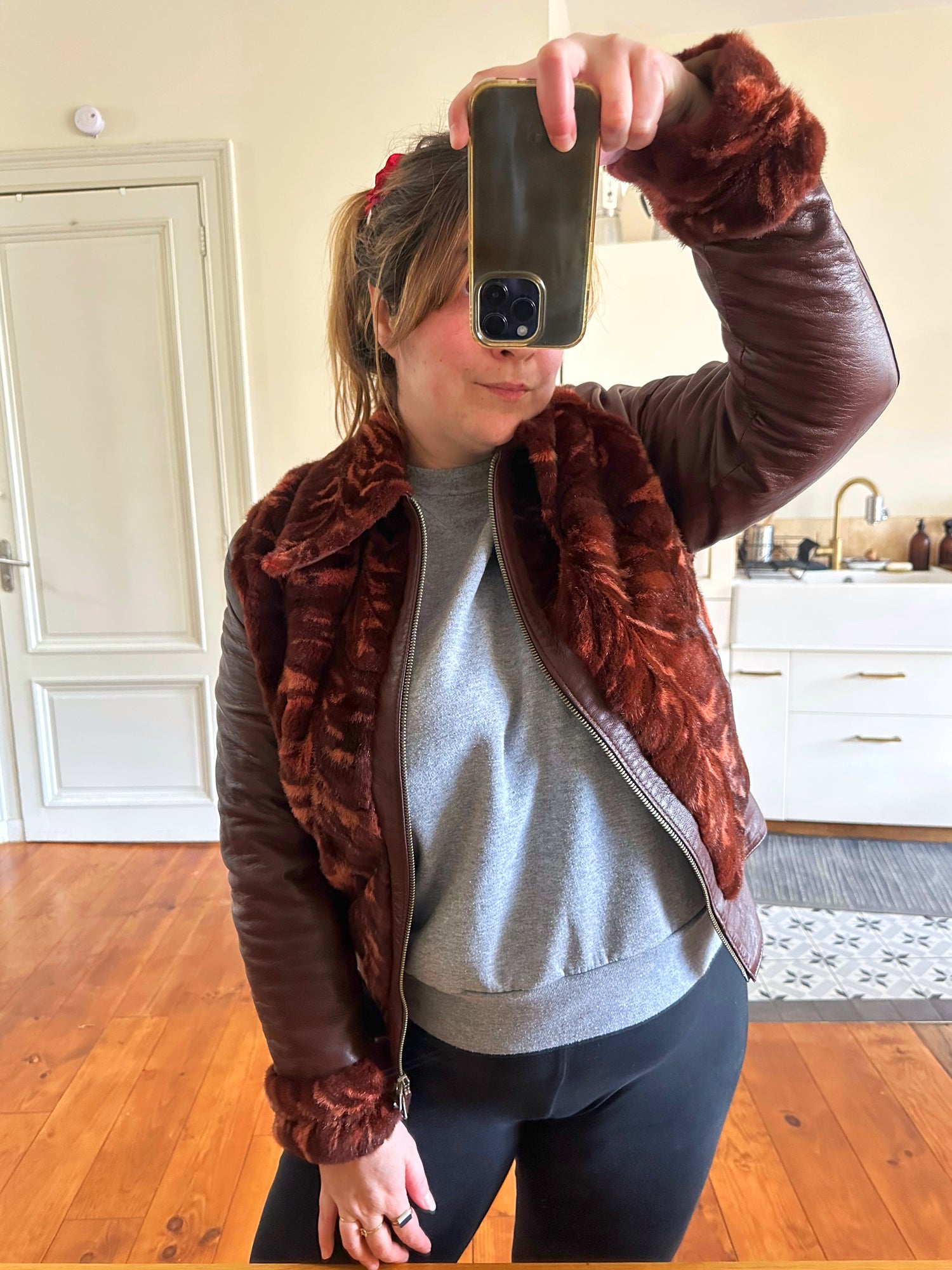 Blouson en cuir et fourrure